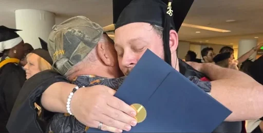 US Navy Submarine Captain - loving his queer son earning an MSW :)