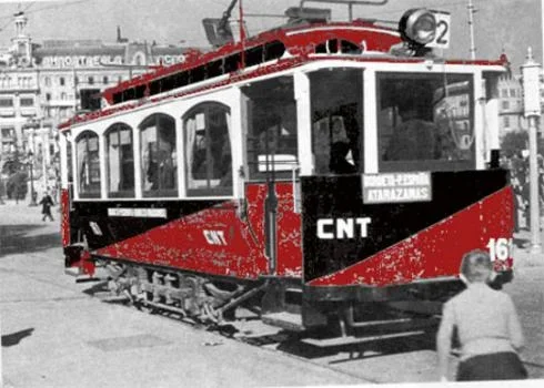 A Barcelona tram painted red and black